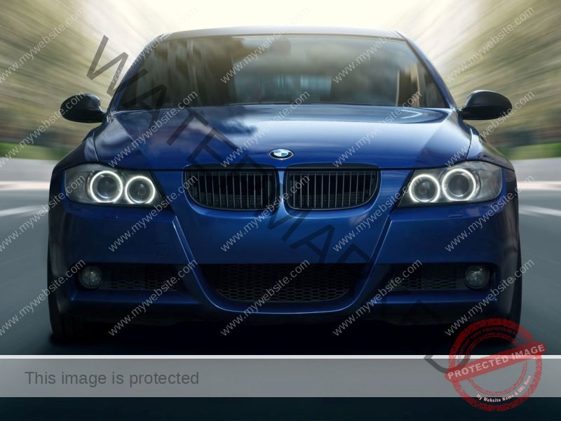 56095244 - moscow, russia - may 10, 2015: blue car bmw 5 series e90/e91 fast speed drive on city road